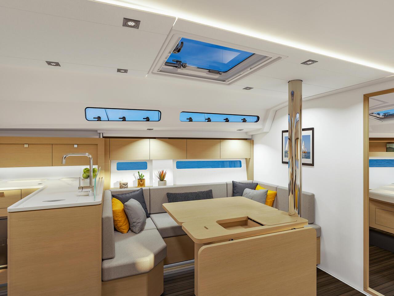 Hanse 410 Innenansicht mit hellem Salon, modernem Design, großzügiger Sitzgruppe und viel Tageslicht durch große Fensterflächen